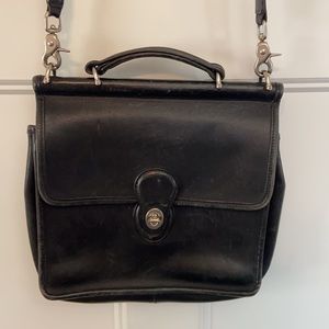 Coach cross body bag in black, leather.